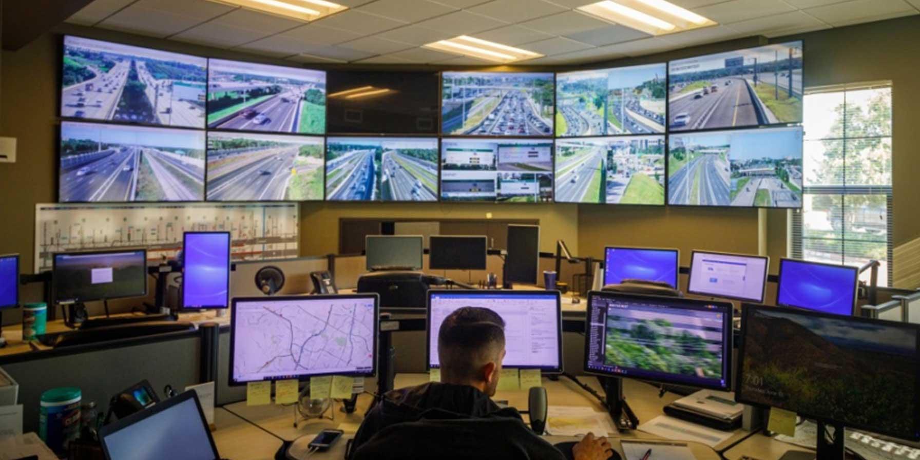 Traffic control center in Austin, TX, with live highway feeds