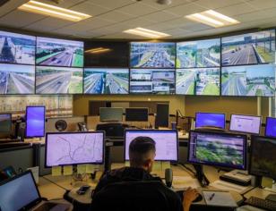 Traffic control center in Austin, TX, with live highway feeds